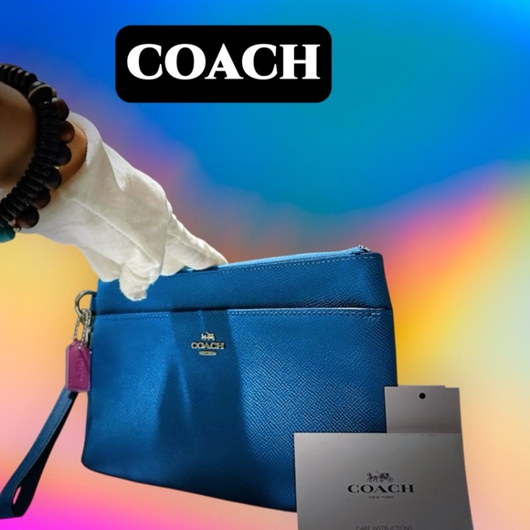 Coach Handbags - Coach Vibrant Blue Wristlet with Pink Accent new without tags